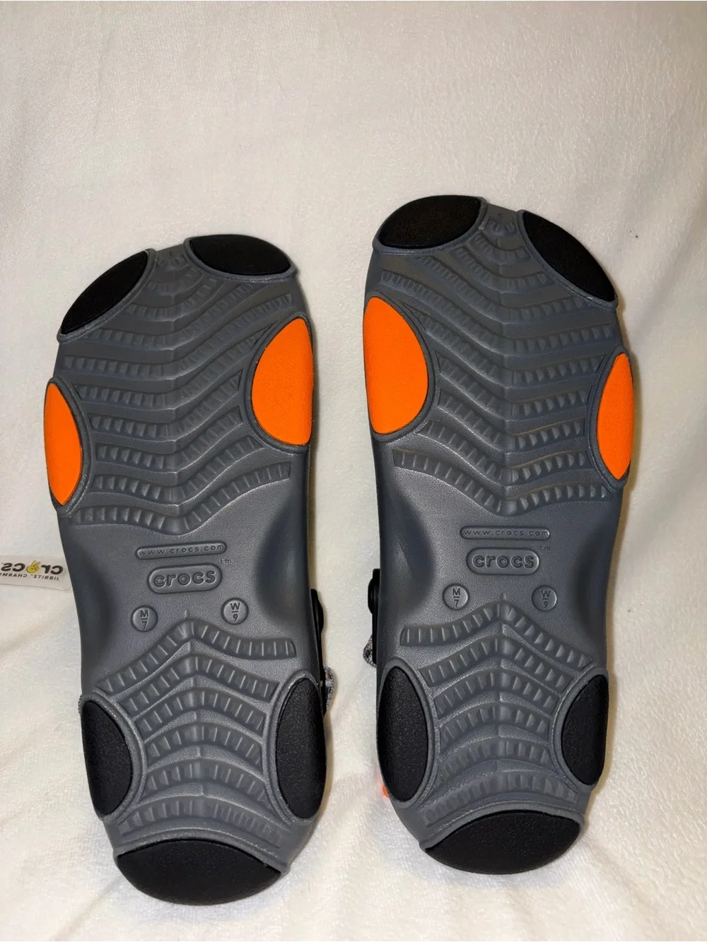 CROCS Gray Sandals with Orange Accent men size 7/women size 9